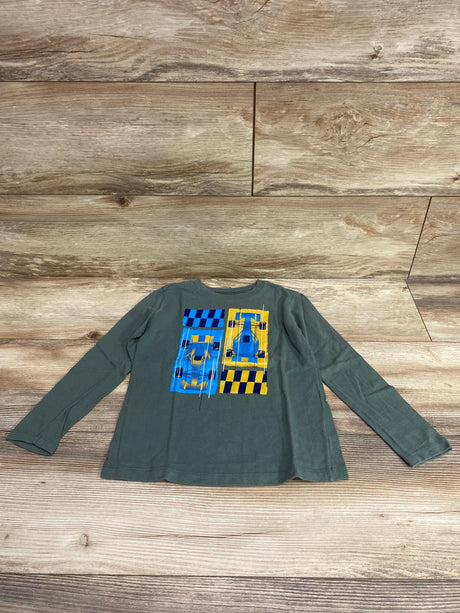 Front view of Carter’s long sleeve shirt showcasing a blue and yellow race car graphic on a green background