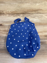 Front flat lay of Cat & Jack blue bubble romper (6-9m) with white stars and tie-shoulder straps on wood background