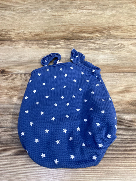Front flat lay of Cat & Jack blue bubble romper (6-9m) with white stars and tie-shoulder straps on wood background
