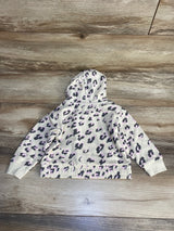 Children's hoodie with pink and black leopard print on cream background, laid flat.