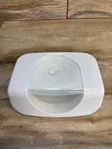 White baby wipe warmer with clear lid on wood surface, ideal for nursery essentials and baby gear