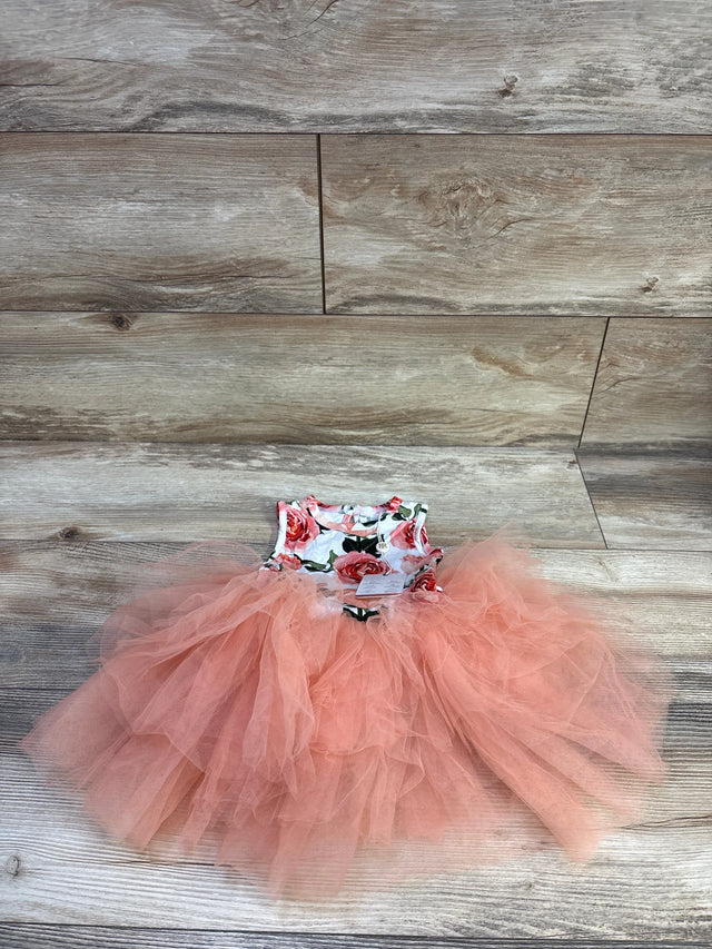 Flat lay of 12–18M Bums and Roses sleeveless dress showing floral bodice and layered peach tulle tutu on light wood floor
