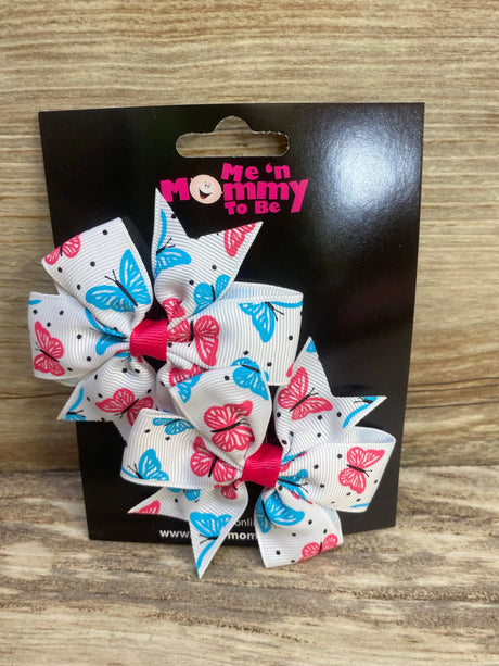 Front view of 2-pack fanned-out toddler hair bows showing pink and blue butterfly print on white ribbon on black display card