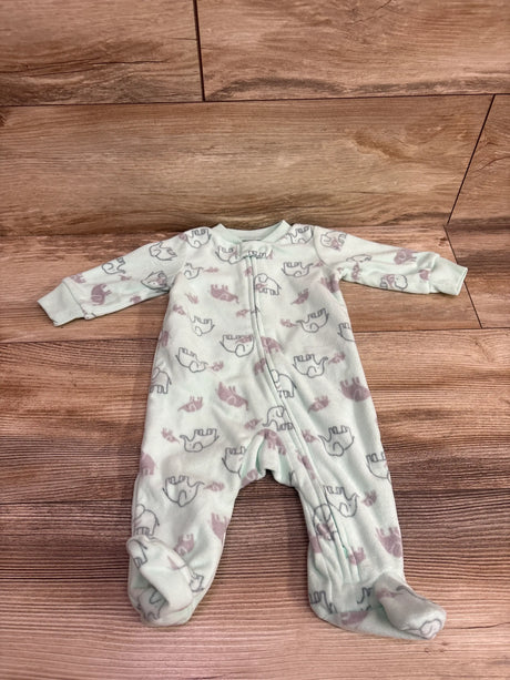 Front view of Simple Joys blanket sleeper showcasing mint green elephant print, zip front, and covered feet on a wood floor