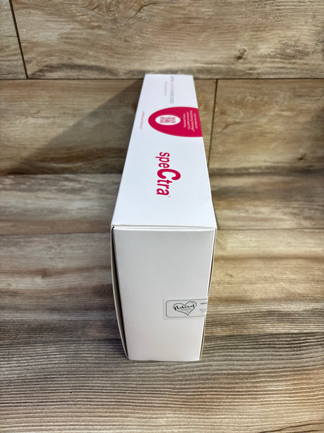 Top view of Spectra Premier wearable breast pump box showing speCtra logo and Natural sticker on wood background