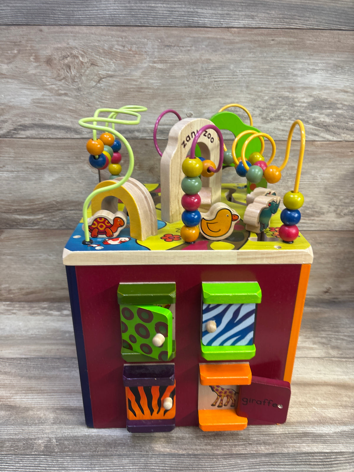 B. toys Zany Zoo Wooden Activity Cube