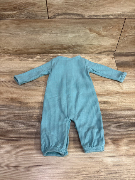 Top view of blue ribbed Just One You footless snap sleeper with long sleeves on a wood-look floor