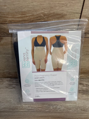 Front view of Marena Maternity post-pregnancy shaper in sealed package showcasing beige short-length compression shorts on wood plank floor