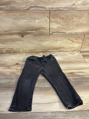 Front flat-lay of Baby Gap toddler grey denim drawstring jeans showing elastic drawstring waistband and straight legs on wood background