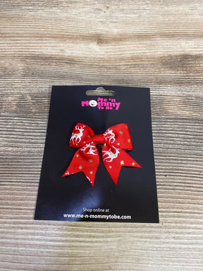 Red reindeer and gold star holiday hair bow for kids, festive Christmas accessory