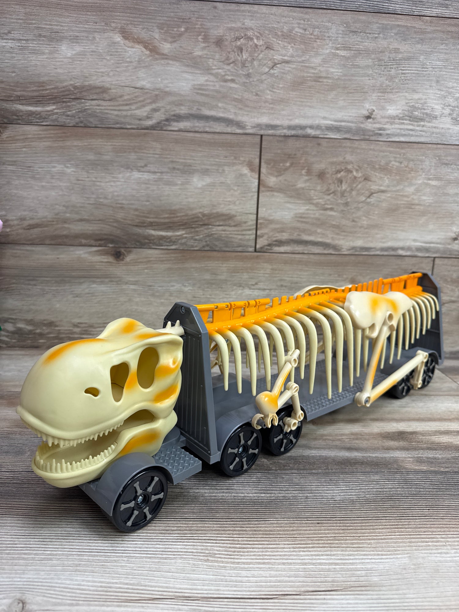Kid Galaxy Skeleton Dinosaur Hauler Transporter Truck