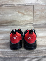 Rear view of Nike Air Max 270 toddler sneakers in black and red showing white AIR heel logo on wood floor