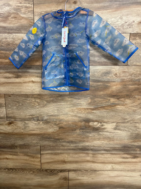 Blue kids raincoat with cloud and lightning print, hanging on a wooden background