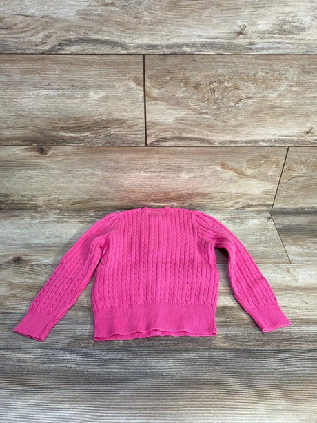 Back view of Polo Ralph Lauren toddler cardigan (3T) in hot pink, cable knit with ribbed cuffs and hem on wood floor