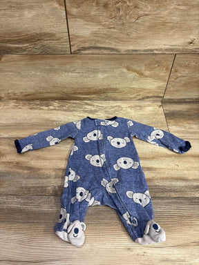 Front view of Carter’s blue newborn sleeper with koala print, zip front, long sleeves, and covered feet on wood-look flooring