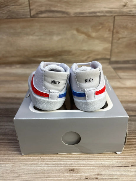Rear view of Nike Blazer Mid CB White Habanero Red sneakers in size 3C showcasing red and blue stripes on a gray shoebox