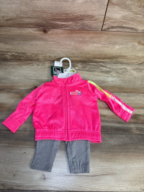 Pink Puma baby tracksuit with gray leggings, full zip jacket, and brand tags on hanger