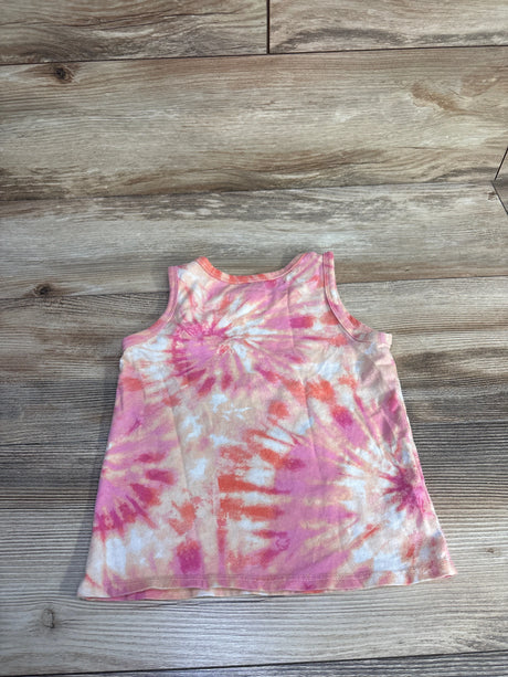 Flat lay of Cat & Jack toddler tank top showing pink and peach tie-dye pattern on light wood background