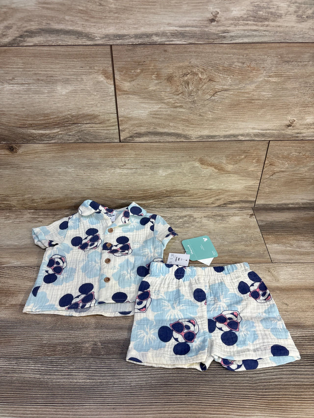 Baby Disney-themed short sleeve shirt and shorts set with Mickey Mouse sunglasses print on wood floor