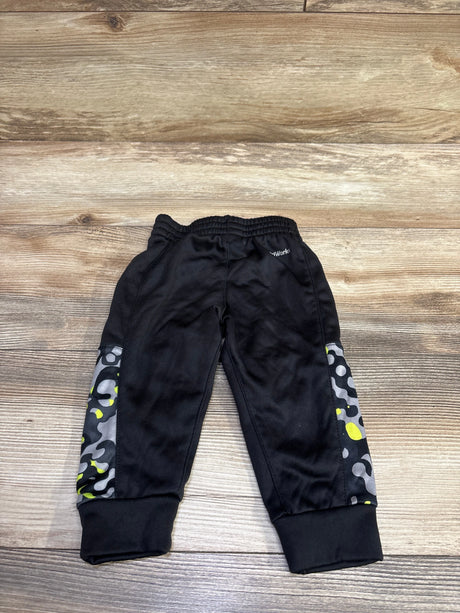 Front view of Athletic Works black pull-on joggers in size 12 months, featuring gray and lime patterned side panels