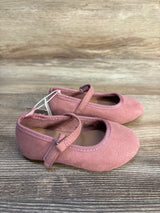 Pink toddler Mary Jane shoes with strap on wood background, resale kids footwear