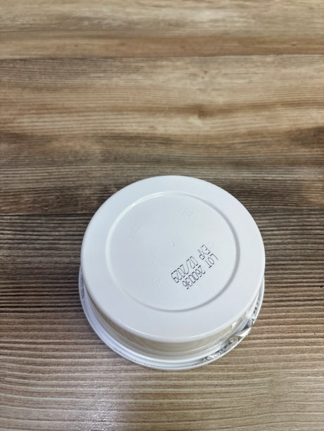 Top view of NEW Birchwood Laboratories A-E-R Medicated Cooling Witch Hazel Pads 40ct showing white lid on wood-grain surface