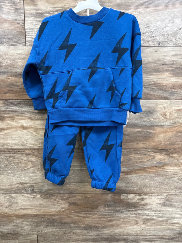Blue toddler sweatshirt and jogger pants set with black lightning bolt print, displayed on hanger