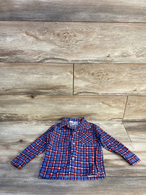 Blue and red plaid long-sleeve button-up toddler shirt on wooden floor background