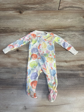 Colorful fruit print baby sleeper with zipper on wood background, long sleeves and footed design
