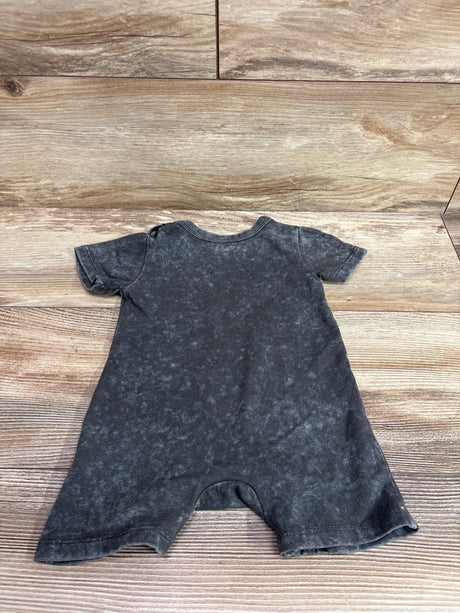 Back view of a grey acid wash DC Batman shortie romper for infants size 12m on a wood background.