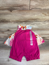 Flat lay of Carter's 3-piece baby dress set (3M) showcasing fuchsia romper over beige floral dress on wood background