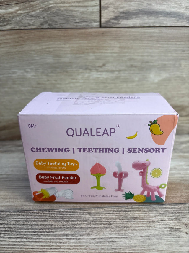 Qualeap baby teething toys and fruit feeder set packaging on wooden surface