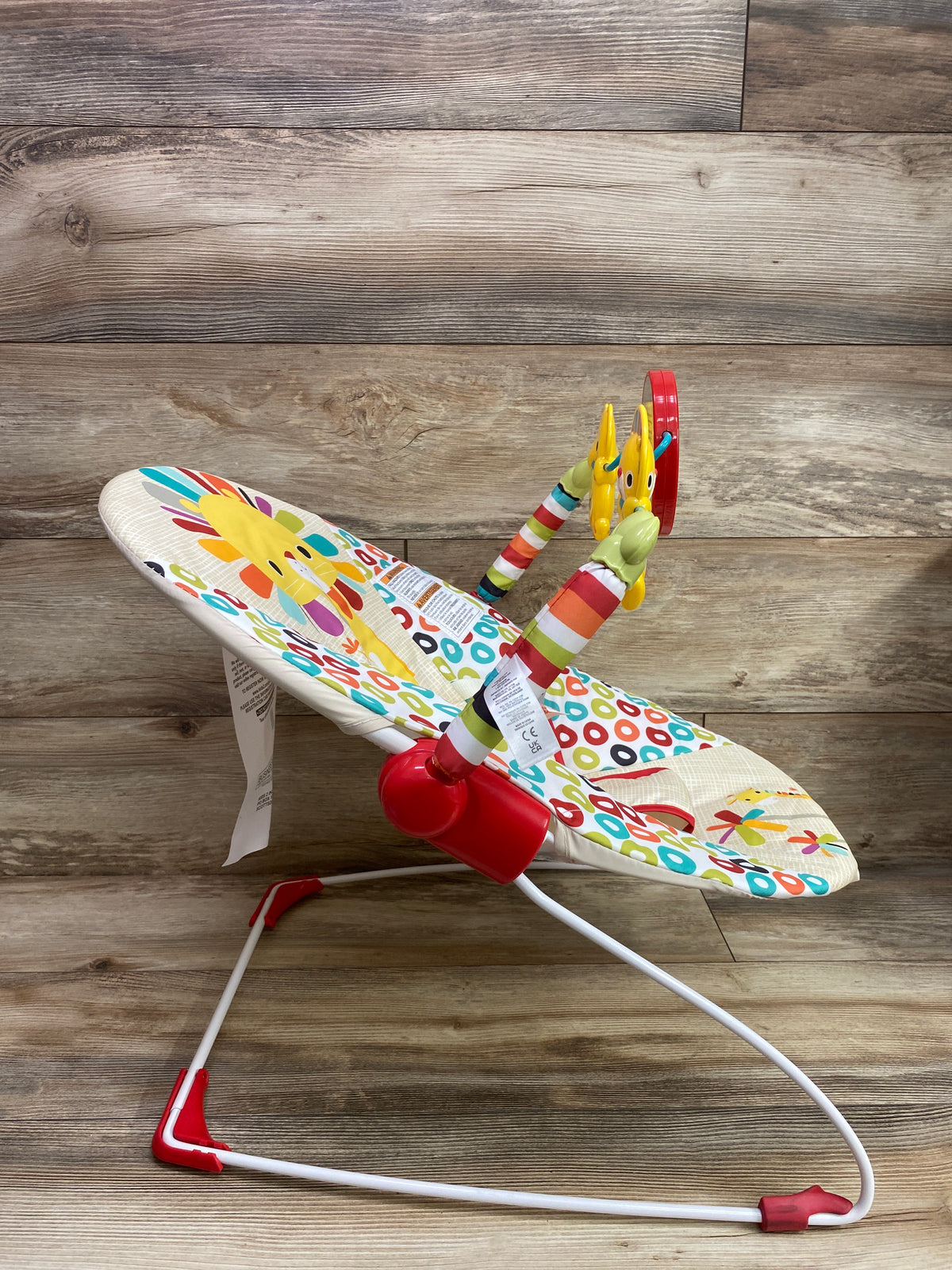 Bright Starts Playful Pinwheel Vibrating Baby Bouncer
