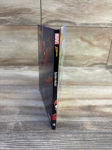 Side view of Marvel Spider-Man Spider-Hulk hardcover book showing spine with Marvel logo and title on a wooden surface