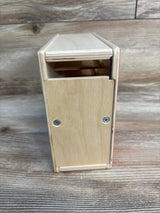 End view of Lovevery Count & Slide Ring Chute showing plywood finish and two screw heads on a wood surface