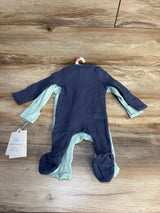 Two ribbed baby footed sleepers, one navy and one light blue, on wooden surface.