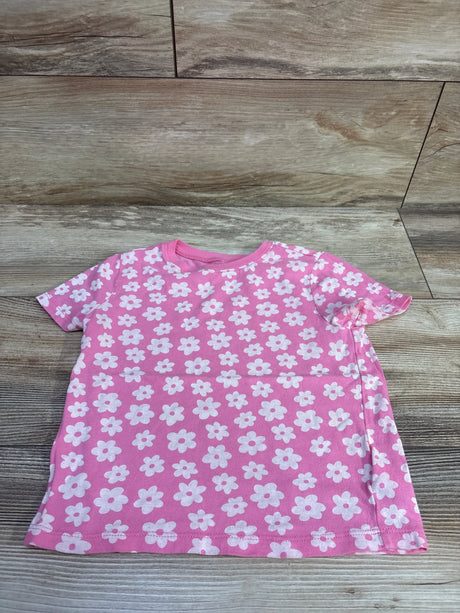 Front view of Old Navy pink shirt in size 5T showcasing an allover white floral pattern on a wood floor