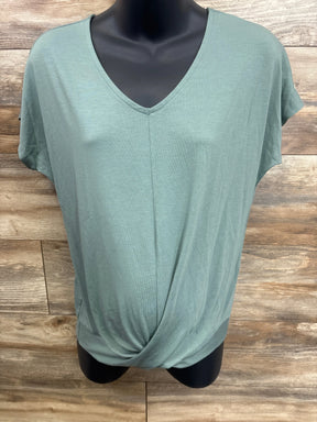 Mint green maternity top with V-neck and front knot detail, displayed on mannequin for resale.