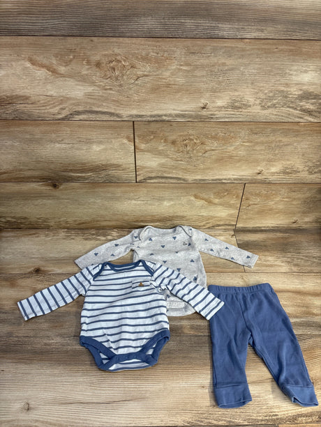 Flat lay of Baby Gap 3-piece set: navy-striped bodysuit, grey bear-print bodysuit, and navy pants on wood backdrop
