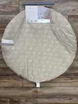 Top view of Tiny Adventures playmat, beige reversible side with white construction vehicles