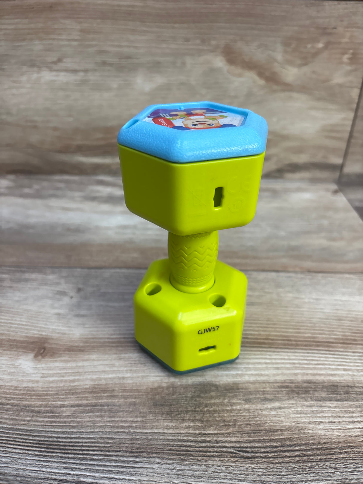 Fisher-Price Laugh & Learn Countin' Reps Dumbbell Rattle Green