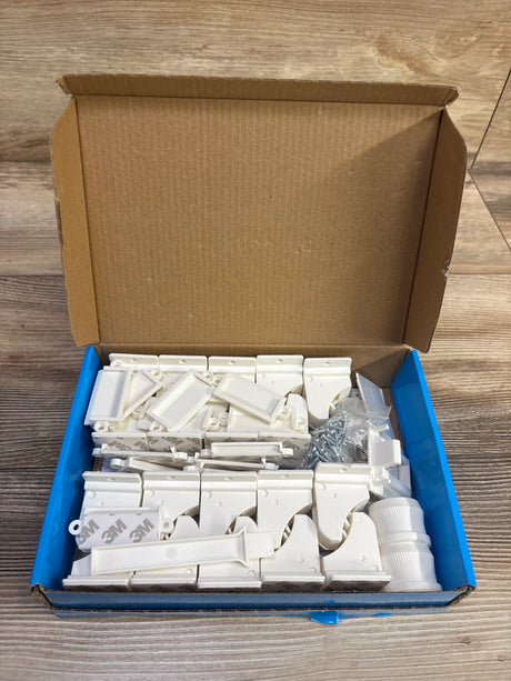 Top view of Vmaisi 19pk baby-proofing magnetic cabinet locks showcasing white locks and mounting hardware in an open box