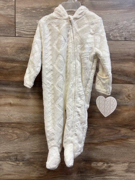 Front view of ivory plush bunting showcasing a hood, zip front, and enclosed feet on a wood background
