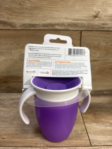 Front view of NEW Munchkin Miracle 360 Trainer Cup 7oz Purple showcasing dual handles and drinking rim in packaging