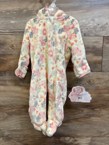 Front view of yellow Little Beginnings plush elephant bunting for size 3/6 months, with fuzzy floral print and footed legs on wood