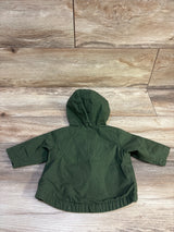 Back view of an Old Navy hooded utility jacket in green for infants size 0-3m on a wood background