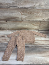 Flat view of Old Navy SoSoft sweater and pants set in brown, size 6 to 12 months, with ribbed cuffs on wood-look flooring