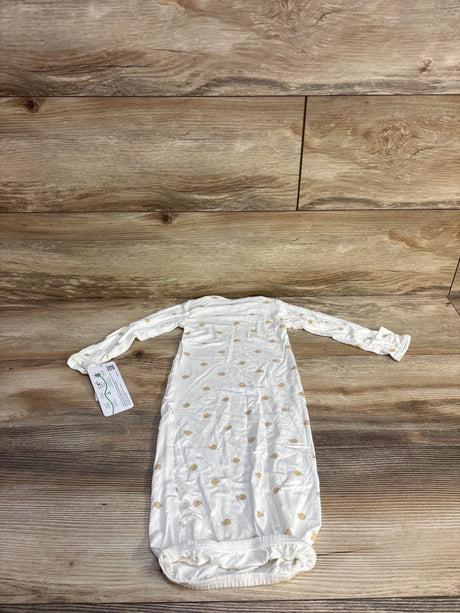 Flat lay of Carter's PurelySoft white infant gown showing tan snail print, long sleeves and elastic gathered bottom on wood surface