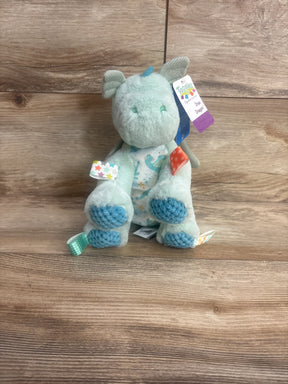 Mint green Taggies dragon plush toy for babies with soft fabric and colorful tags