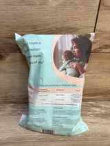 Breast milk storage bag with temperature guidelines, woman holding baby, on wood surface